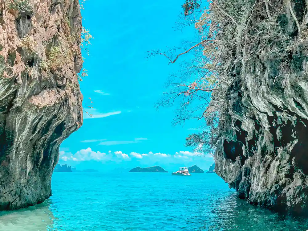 Narrow passage between two tall limestone rock formations