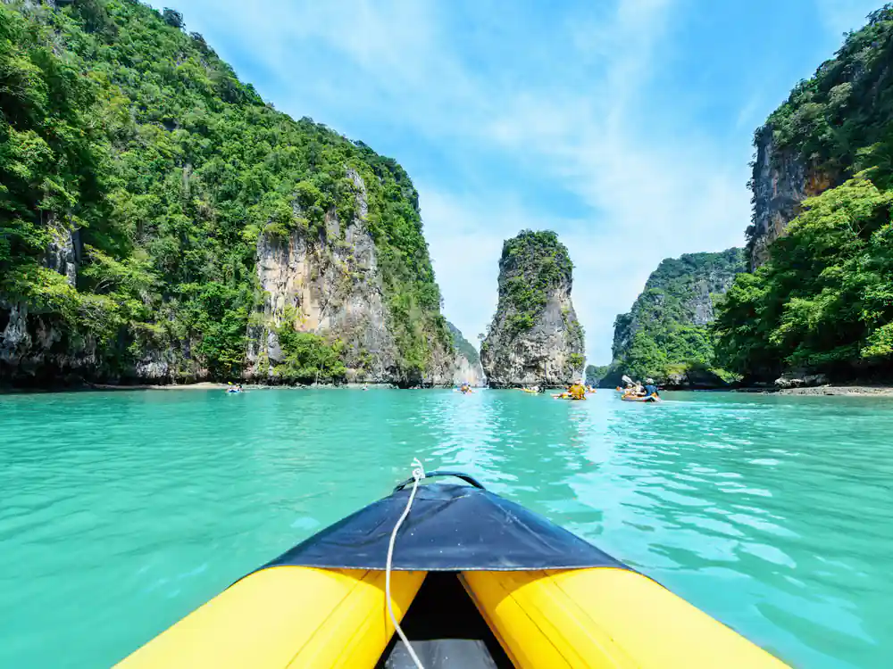 View from kayak bow toward limestone formations